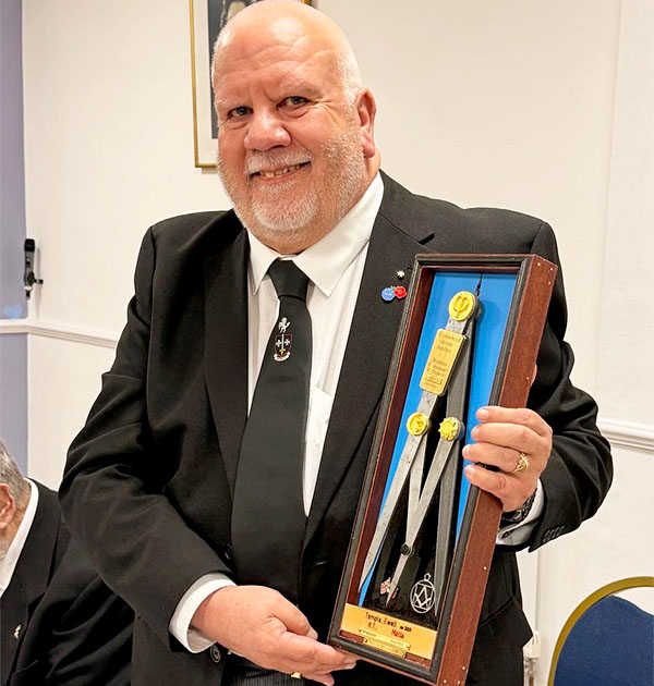 E.Kt. John Martin with the Presentation Plaque
